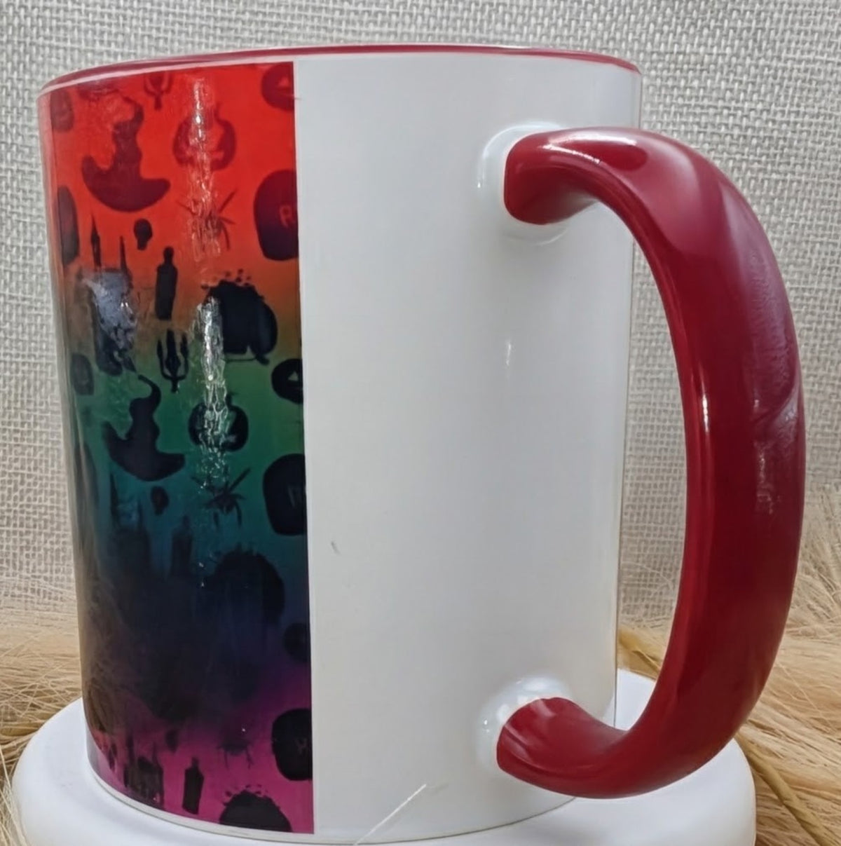 Rainbow Halloween burgundy mug real product photo 2