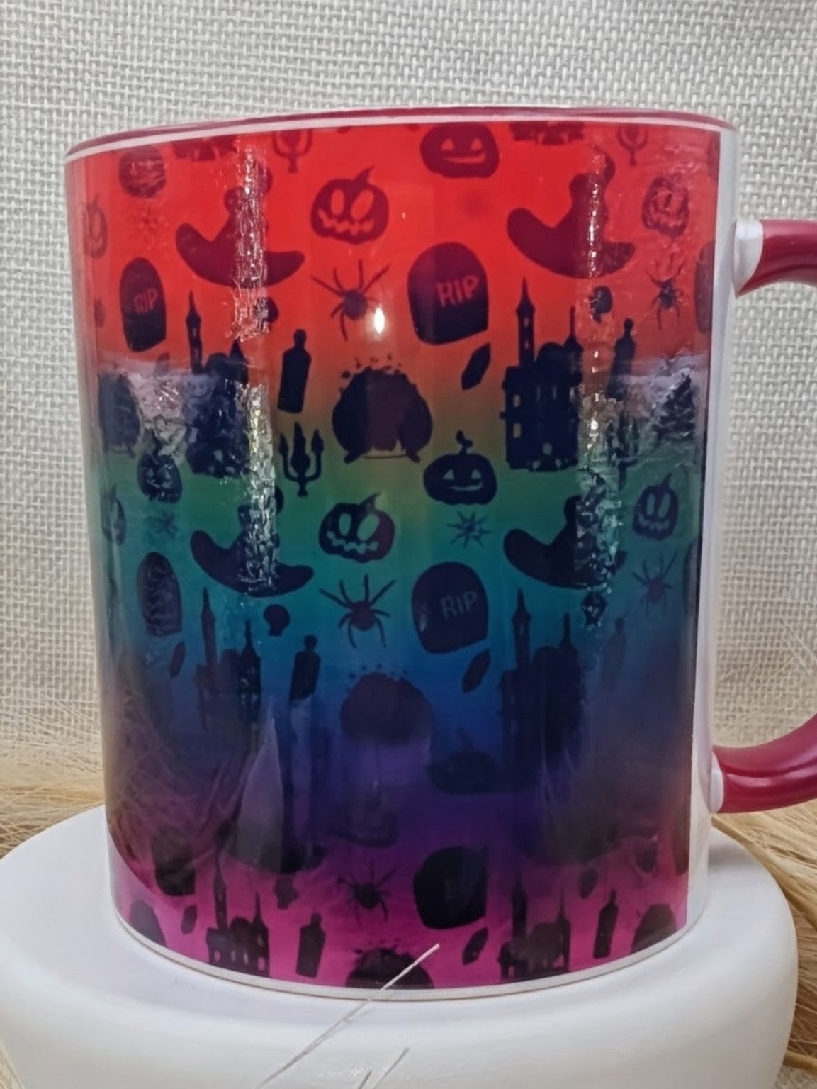 Rainbow Halloween burgundy mug real product photo 3