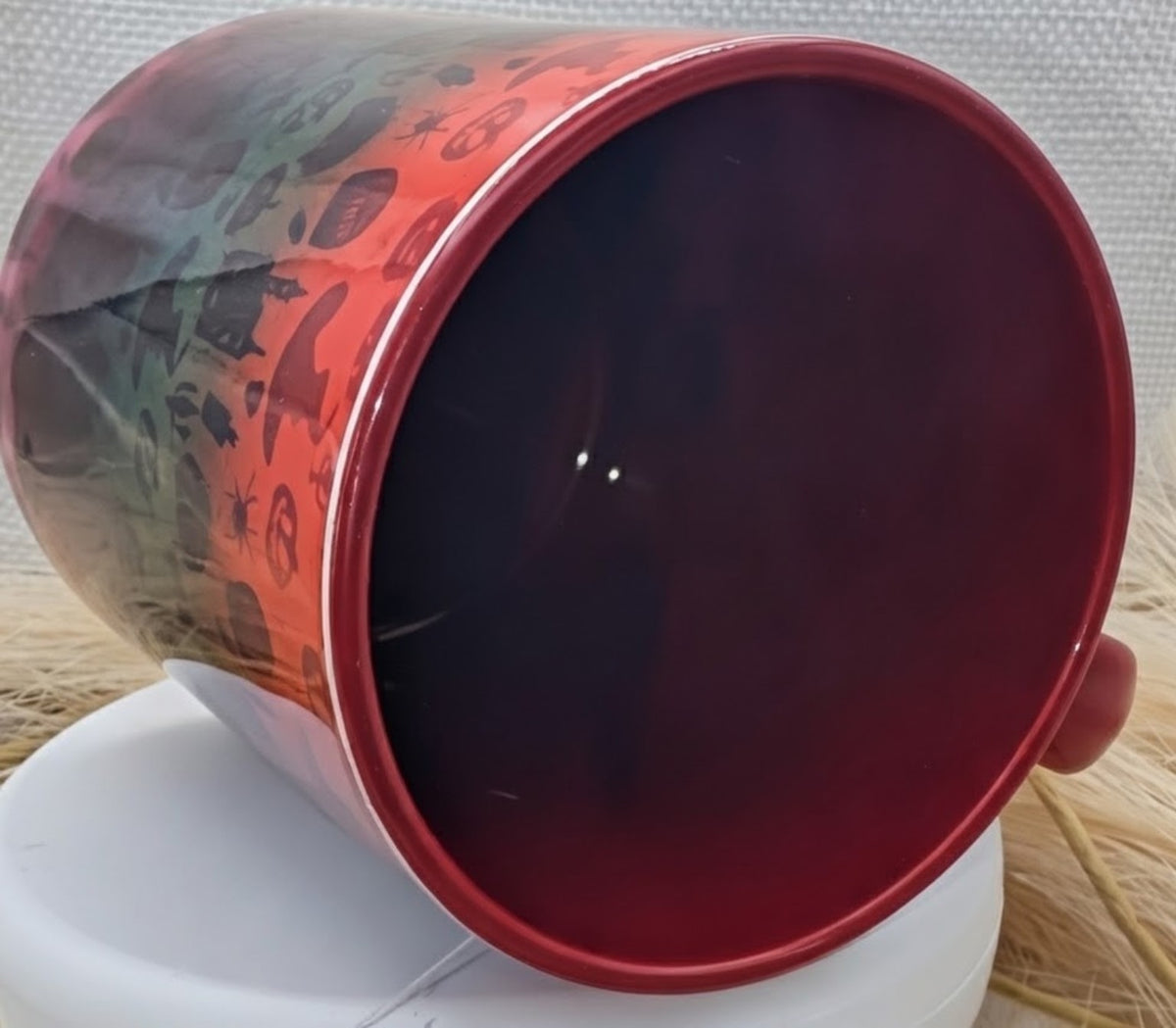Rainbow Halloween burgundy mug real product photo 6